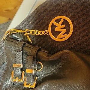 Michael Kors Black Bag with Elegant Branding and Textured Fabric